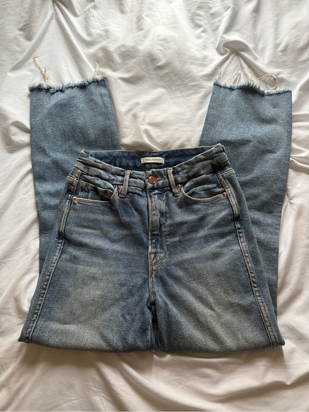 Good American Light Blue Straight Leg Jeans with Frayed Hem